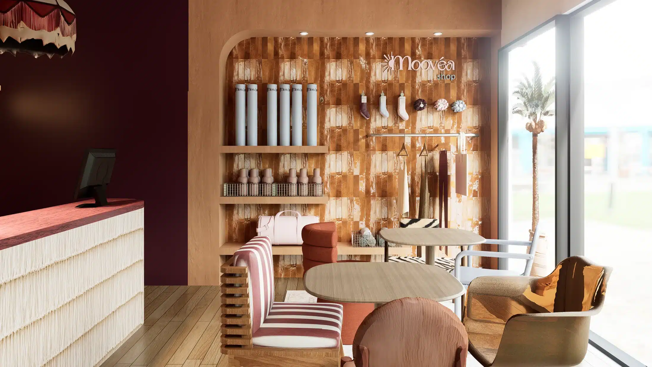 L'accueil du studio moovéa : comptoir, vitrine et lumière du jour
